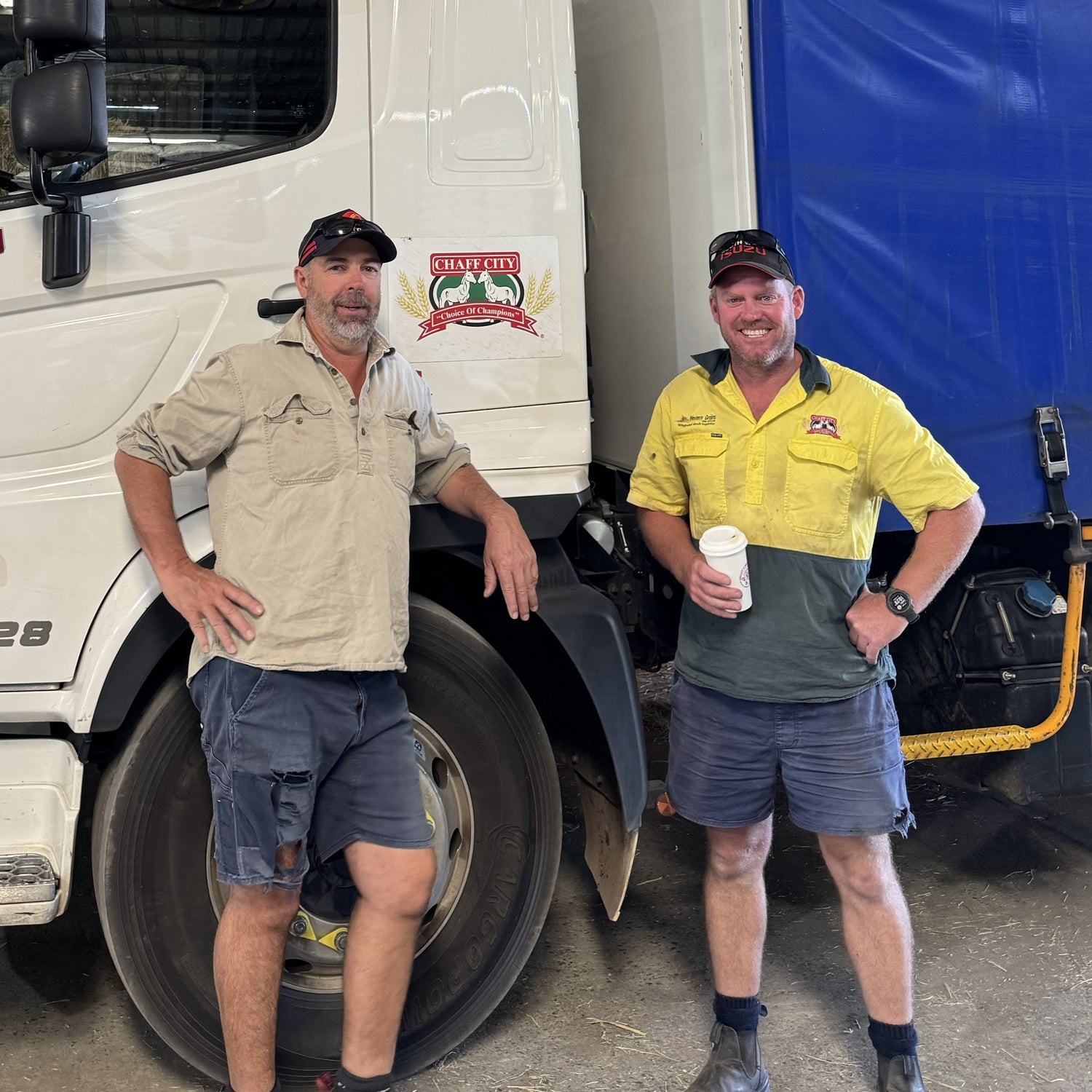 Rob Clayton (WA Stockfeeds Owner) with Garth King (WA Stockfeeds Manager) in front of a Chaff City truck.